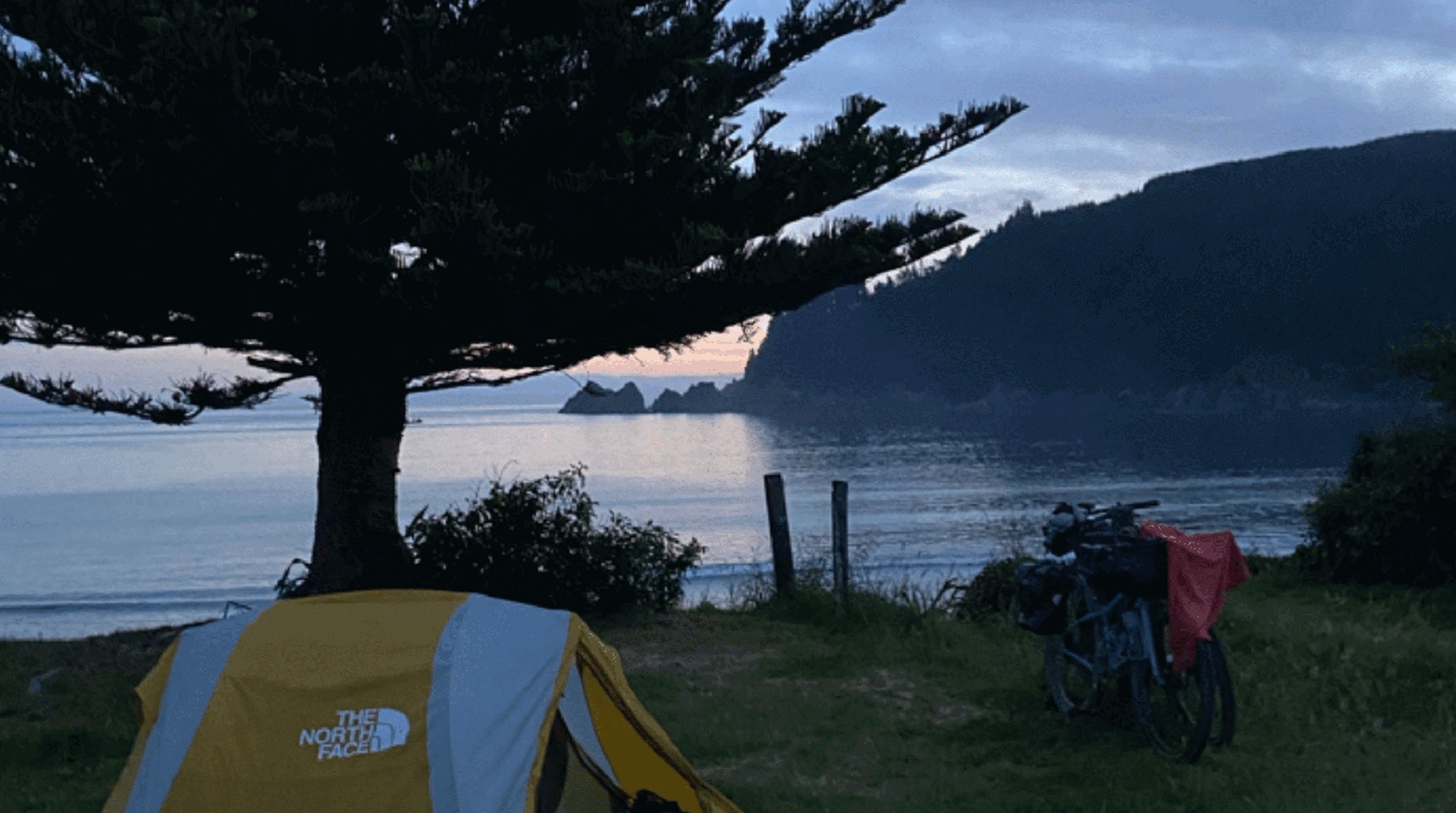 Bikepacking and camping with lake view at dusk, Taupō region