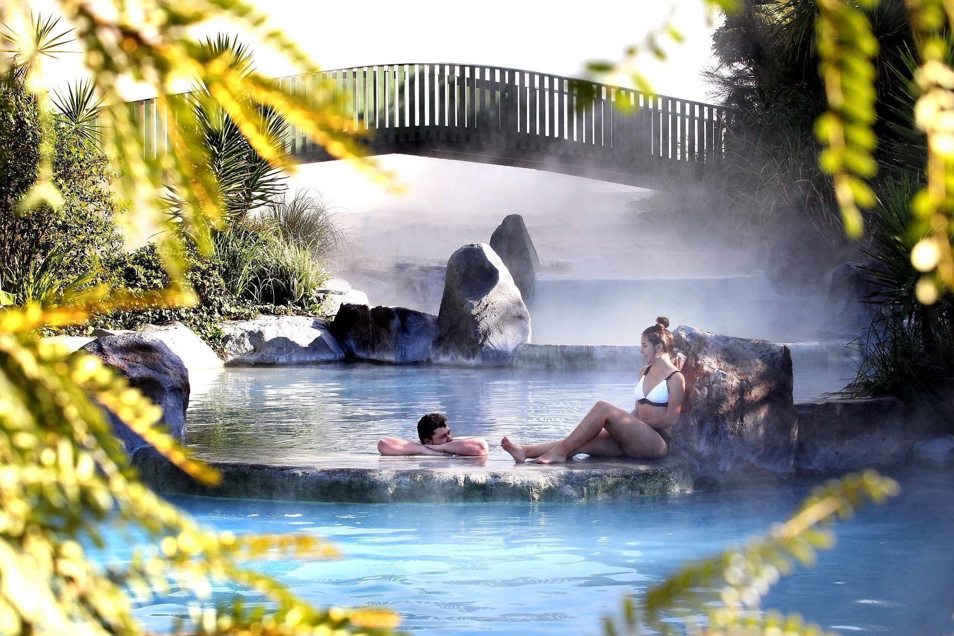 2504_img_taupo_town_wairakei_terraces_geothermal_couple_relaxing_in_hot_pools_adults